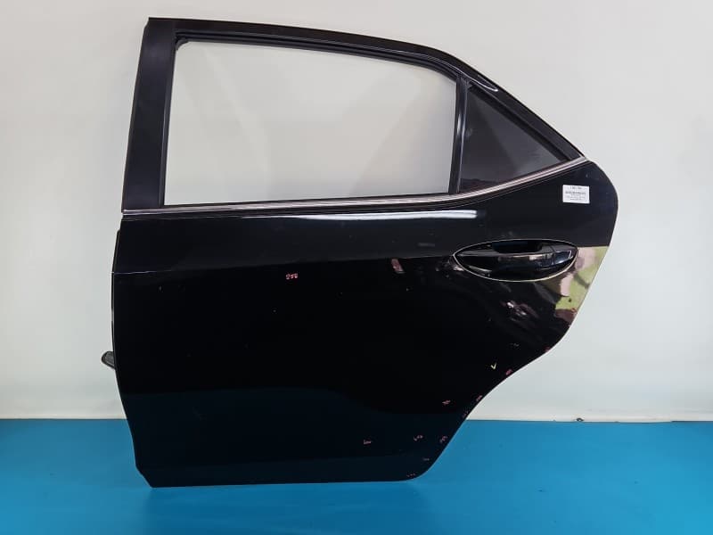 Drzwi tył lewe Toyota Corolla E16 E18 13- sedan 4d 209