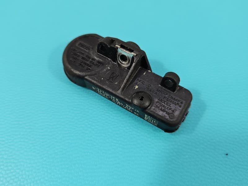 Czujnik ciśnienia opon Ford Mustang V 04-14 9L3T-1A180-AF 3370DF85 TPMS