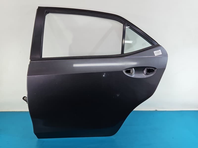 Drzwi tył lewe Toyota Corolla E16 E18 13- sedan 4d 1G3