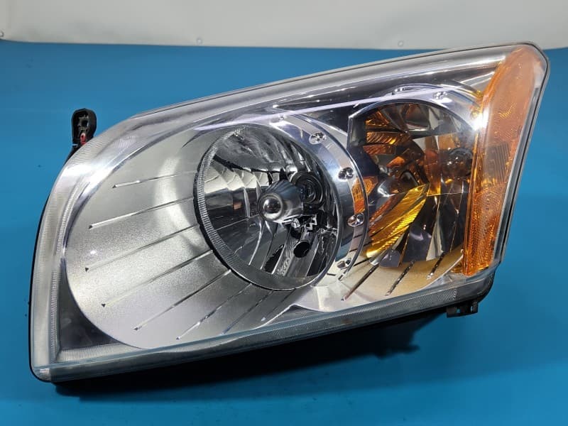 Reflektor lewy lampa przód Dodge Caliber EUROPA 05303741AL