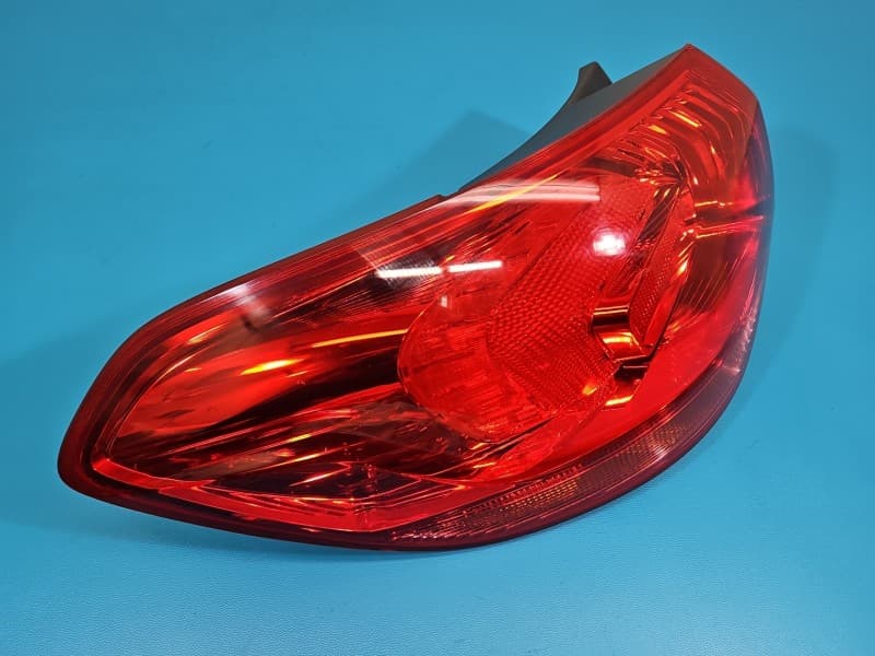 Lampa tył lewa błotnika Opel Astra IV J kombi EUROPA 13282242