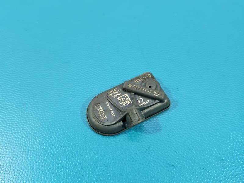 Czujnik ciśnienia opon Opel Astra V K 39186445 TPMS