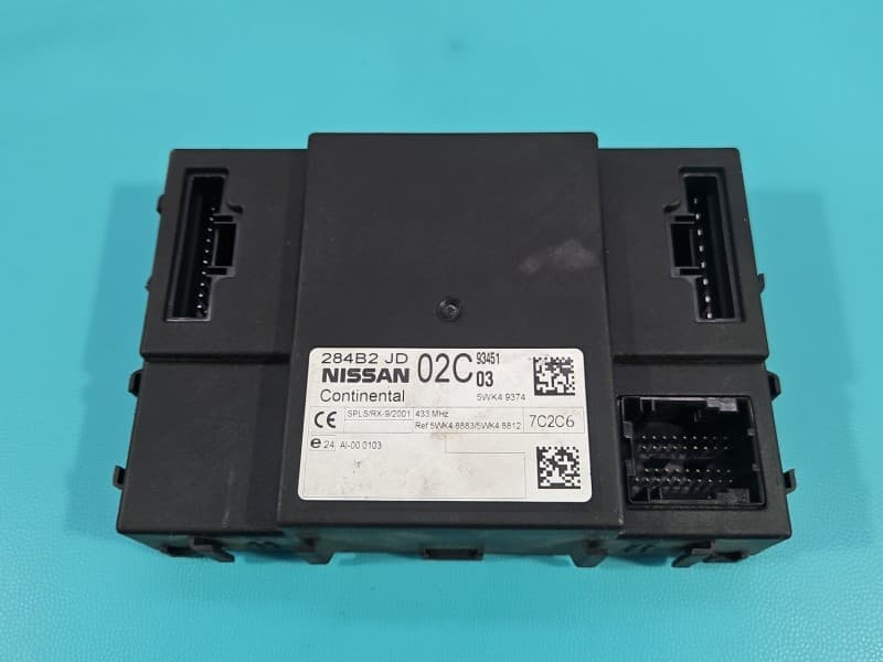 Sterownik moduł komfortu Nissan Qashqai I J10 06-13 284B2JD02C uszkodzona obudowa