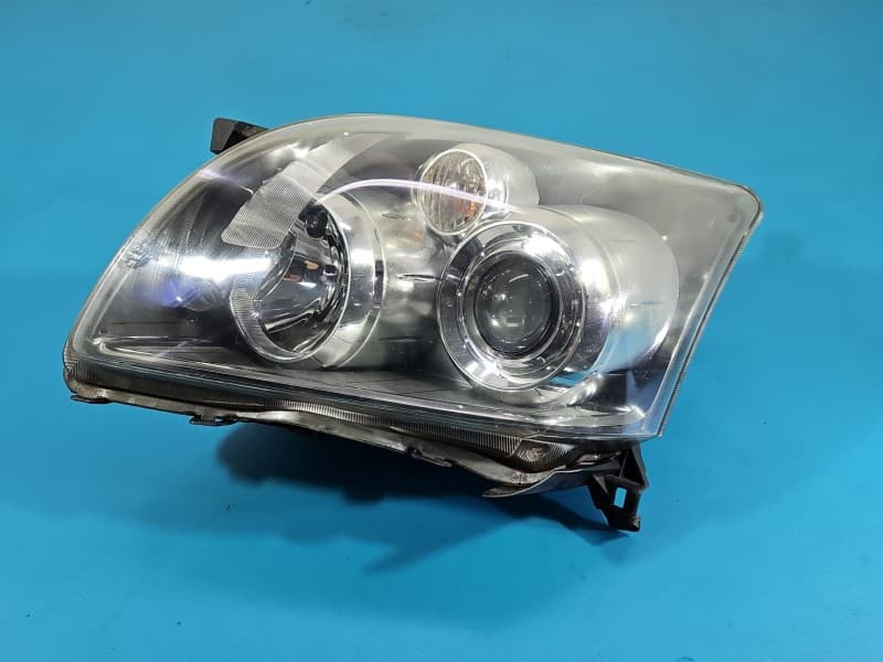 Reflektor lewy lampa przód Toyota Avensis II T25 EUROPA