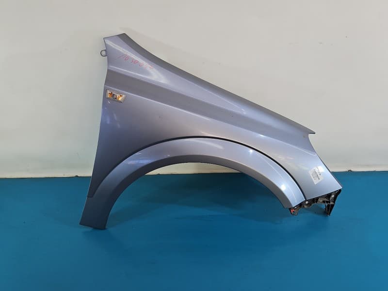 Błotnik przód prawy Opel Astra III H Z163