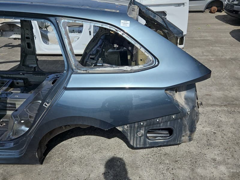 Błotnik tył lewy ćwiartka Skoda Octavia IV LF7Y kombi