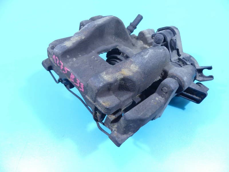 Zacisk tył lewy Volvo S90 II 16- sedan 2,0 T5