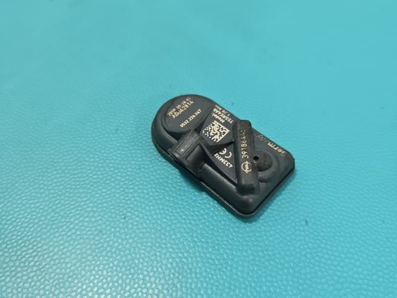 Czujnik ciśnienia opon Opel Astra V K 39186445 TPMS