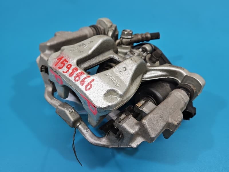 Zacisk tył prawy Toyota Corolla E21 19- sedan 1,8 16V