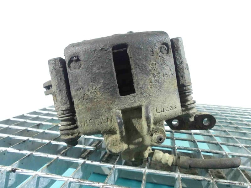 Zacisk przód prawy Nissan Micra K11 1,5d