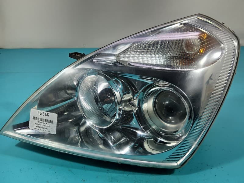 Reflektor lewy lampa przód Kia Carnival II 05-14 EUROPA 92101-4D0