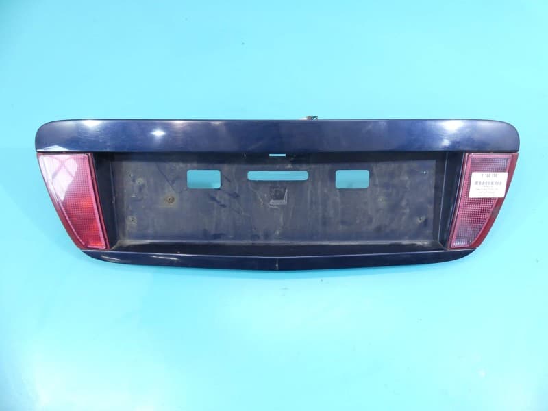 BLENDA LISTWA klapy TYŁ 90810AU400 Nissan Primera P12 KOLOR granatowy