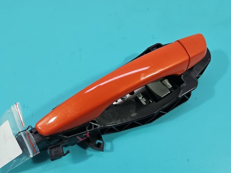 Klamka tył lewa zewnętrzna Opel Corsa F 9802977380 pomarańczowy KVH