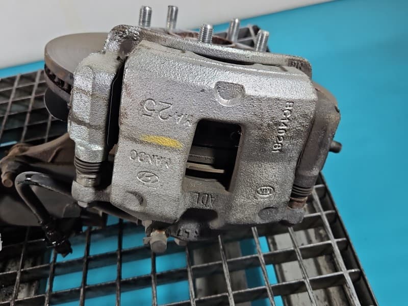 Zacisk przód lewy Hyundai Elantra VI 15-20 1,6 16V