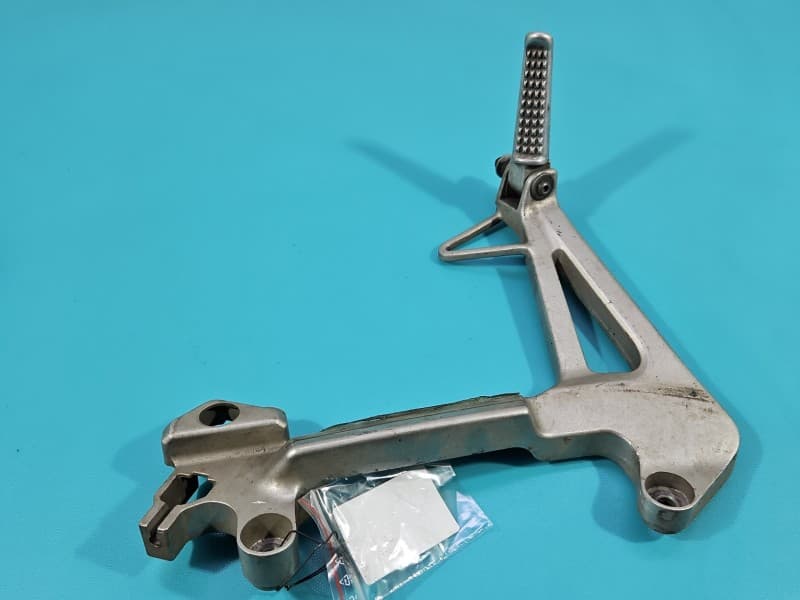 Mocowanie uchwyt podnóżek set tył lewy Honda VFR 800 98-01