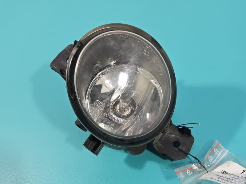 Halogen lewy Nissan Qashqai I J10 06-13 89206411