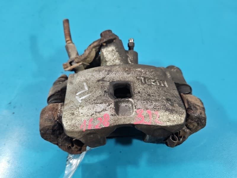 Zacisk tył lewy Toyota Corolla E11 HB 1.4 16V