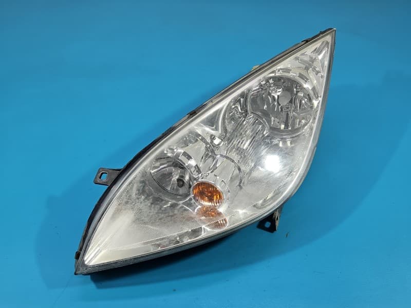Reflektor lewy lampa przód Mitsubishi Colt Z30 VI 04- EUROPA 8301A283 0301208201