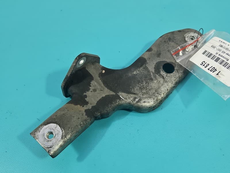 Mocowanie uchwyt podnóżka lewego Suzuki Burgman 400 07-09