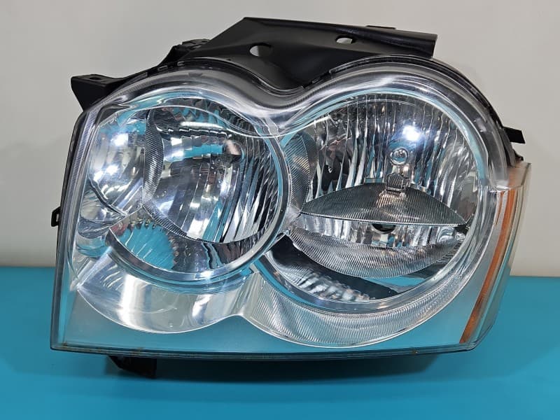 Reflektor lewy lampa przód Jeep Grand cherokee III WK EUROPA 55156351AH