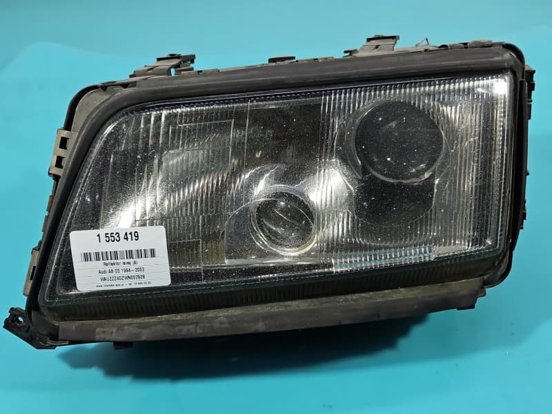 Reflektor lewy lampa przód Audi A8 D2 EUROPA 4D0941003L 0301047211