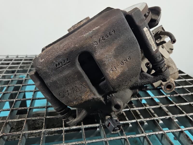 Zacisk przód prawy Vw Golf VII 1,6 tdi CLH