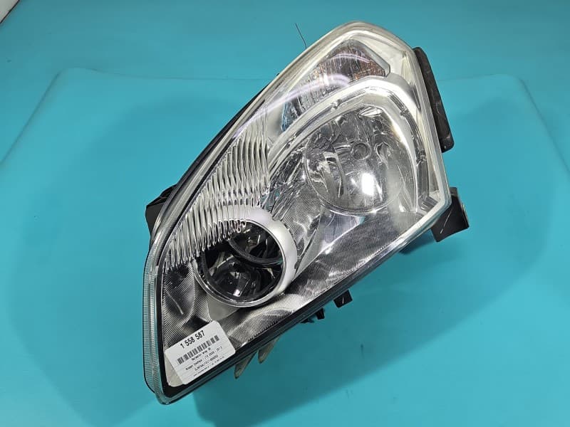 Reflektor lewy lampa przód Nissan Qashqai I J10 06-13 EUROPA 1EF238042-01 26060JD90B