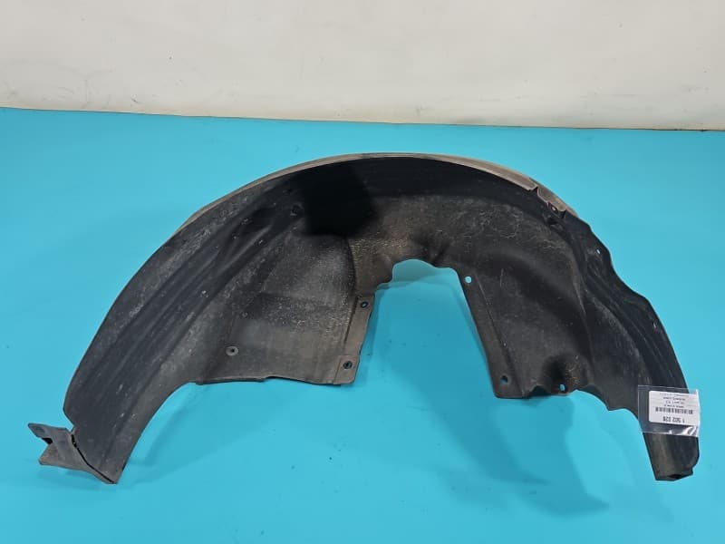 Nadkole tył lewe Opel Astra V K 89040882