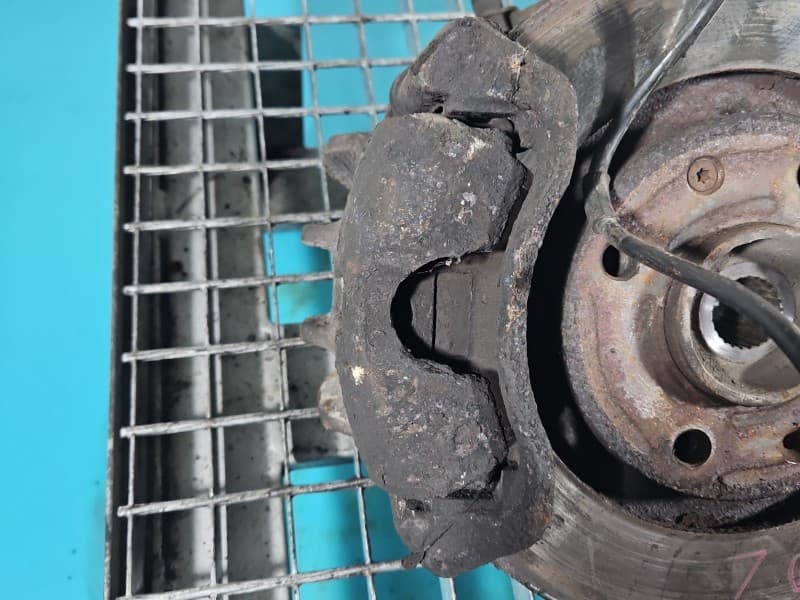 Zacisk przód lewy Citroen Berlingo I 2,0 hdi