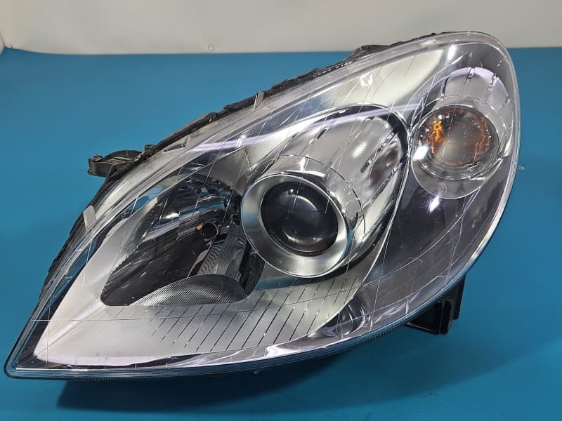 Reflektor lewy lampa przód Mercedes W245 EUROPA 0301247201 A1698207761