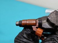 TESTOWANY Wtryskiwacz Mitsubishi Space star 7310324 1.6 16V