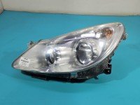 Reflektor lewy lampa przód Opel Corsa D EUROPA