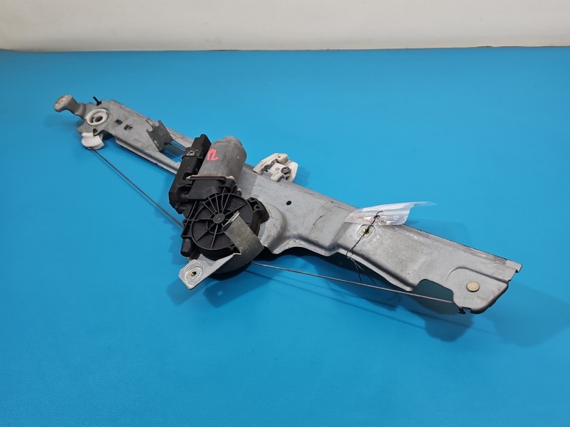 Podnośnik przód lewy Renault Scenic II 440726 5d HB