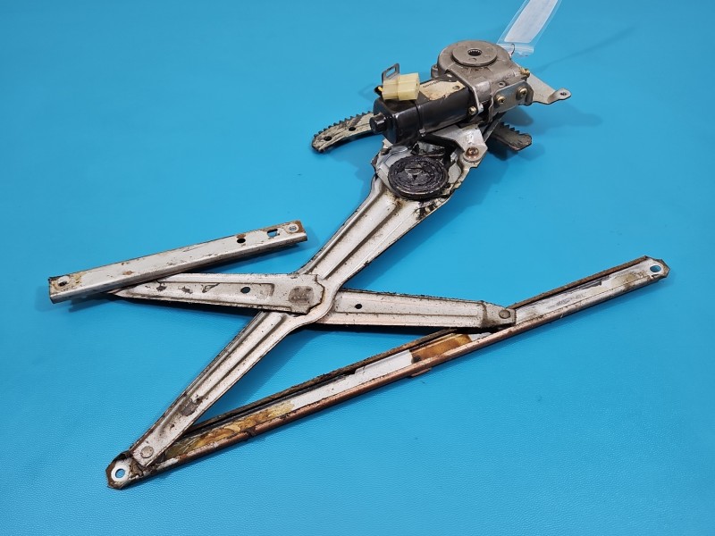 Podnośnik przód lewy Daewoo Tico 5d HB