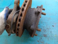 Zacisk tył lewy Mazda Premacy 2.0 ditd HB