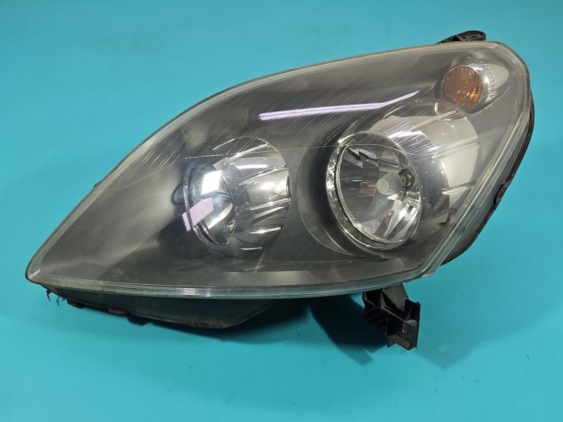 Reflektor lewy lampa przód Opel Zafira B EUROPA 24451052LH