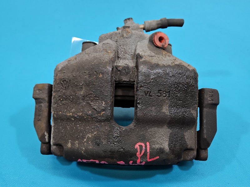 Zacisk przód lewy Vw Scirocco III 08- 1.4 TSI CAV