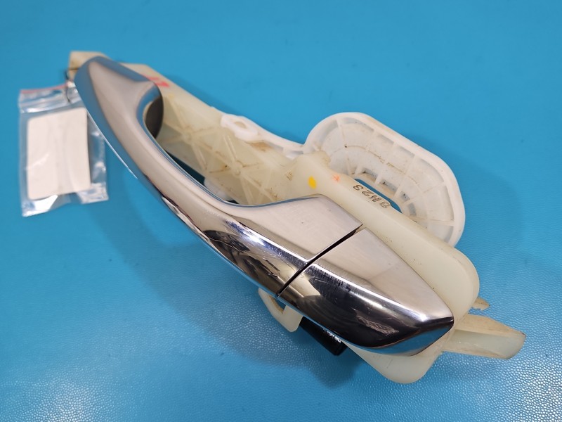 Klamka tył lewa zewnętrzna Hyundai Santa Fe III 12–18 91370-03100