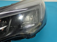 Reflektor lewy lampa przód Opel Astra V K EUROPA 39195688, 662588537