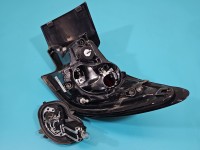 Lampa tył lewa Producent części: OPEL, 19-22 Z LISTWĄ ŻARÓWKOWĄ HATCHBACK W BŁOTNIK Opel Astra V K HB