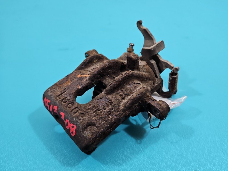 Zacisk tył lewy Ford Focus Mk1 1.8 tdci kombi