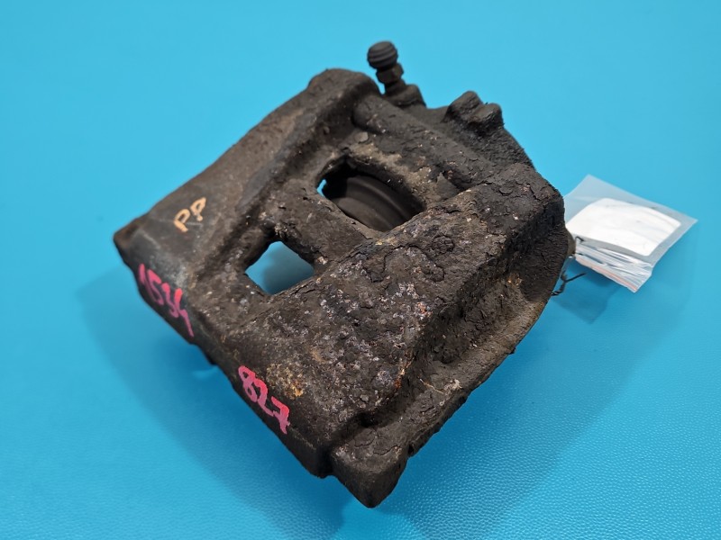 Zacisk przód prawy Vw Tiguan I 07- 1.4 TSI