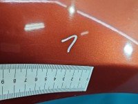 Błotnik przód prawy Dacia Sandero I 08-12 bordowy TEB76