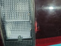 Lampa tył lewa Producent części: OPEL, Ichikoh, pęknięty klosz wewnątrz, rysy Opel Monterey HB