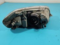 Reflektor lewy lampa przód Chevrolet Aveo T250 EUROPA