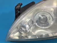Reflektor lewy lampa przód Opel Corsa C EUROPA 13100535