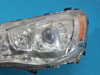 Reflektor lewy lampa przód Mitsubishi Outlander II 06-13 EUROPA