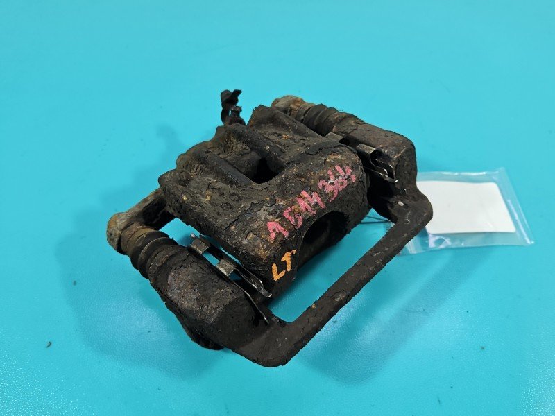 Zacisk tył lewy Kia Sportage II 04-10 2.0 crdi (D4EA) HB