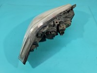 Reflektor lewy lampa przód Renault Megane II EUROPA 7701064018