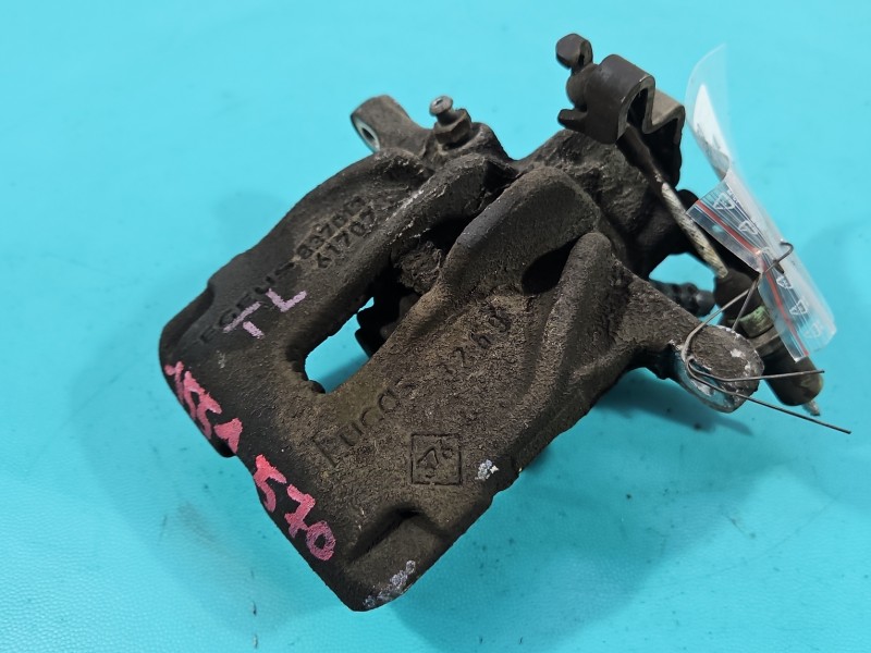 Zacisk tył lewy Renault Trafic III 2.0 dci HB